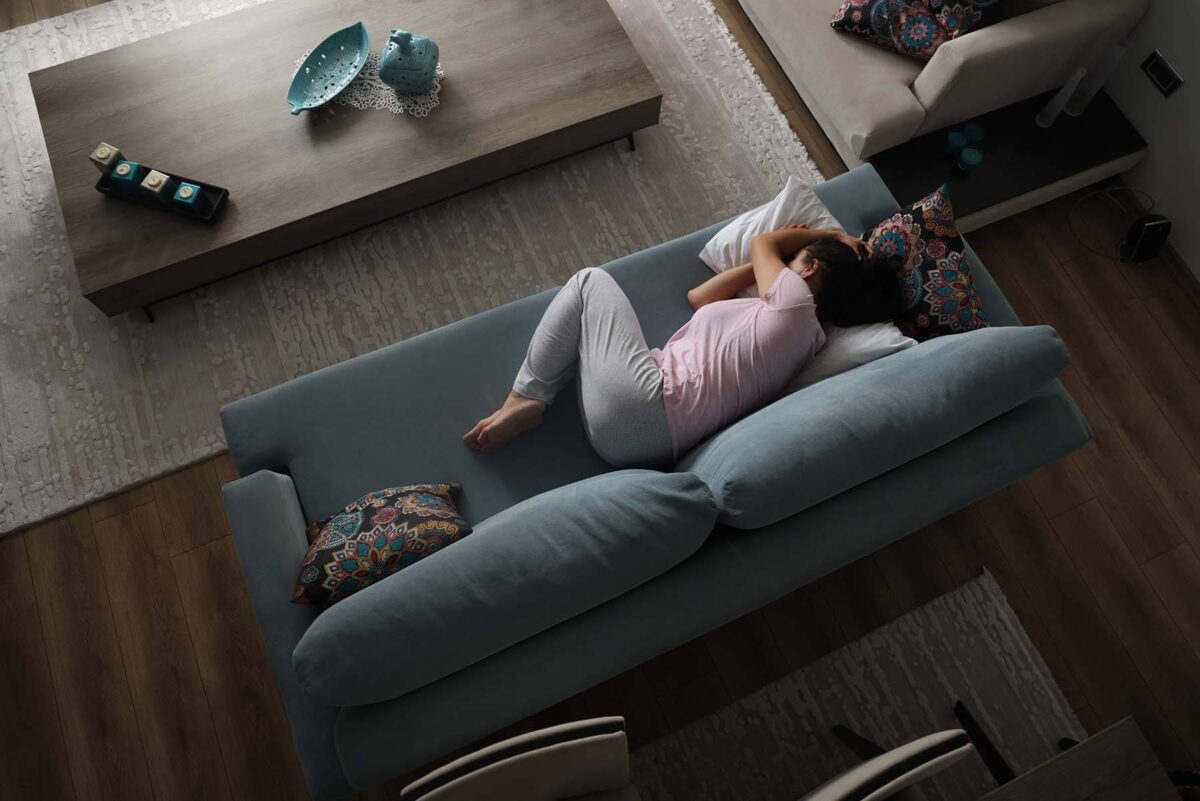 Depressed woman on couch