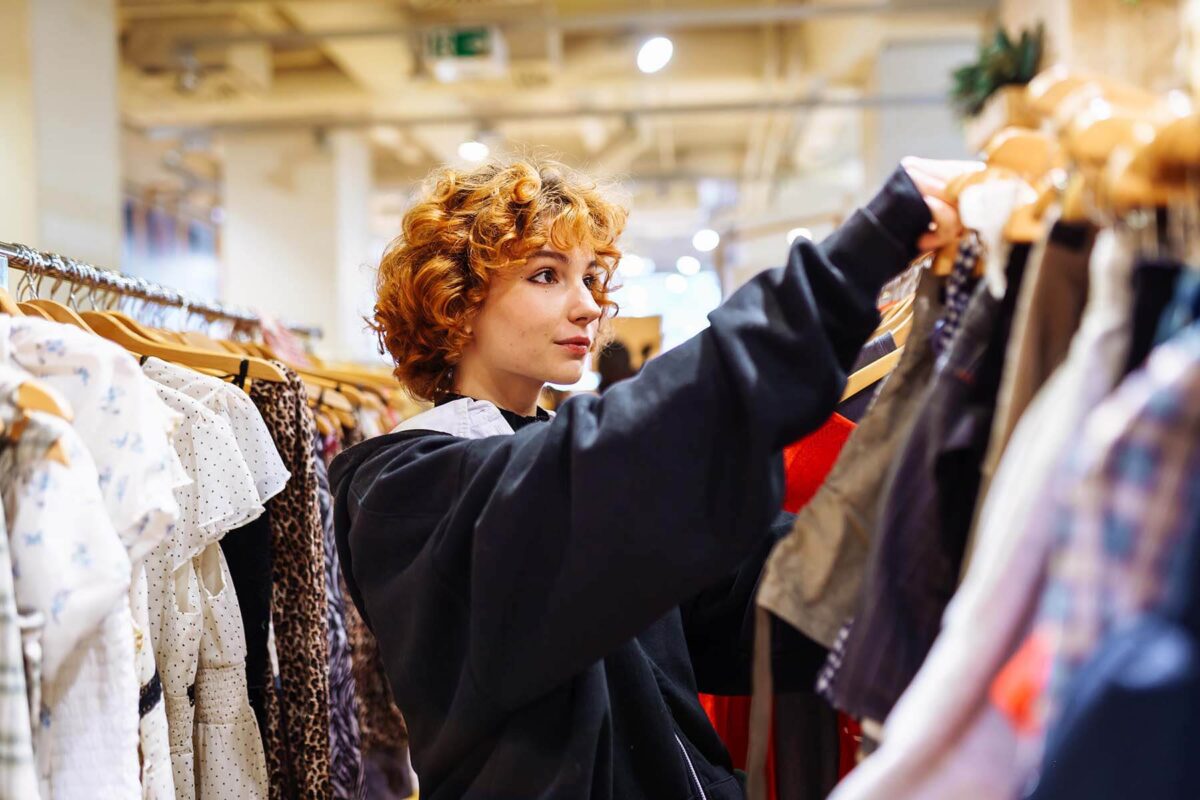 Young woman shopping for clothes